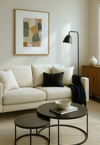 Modern living room with abstract green, brown and yellow art on the wall.