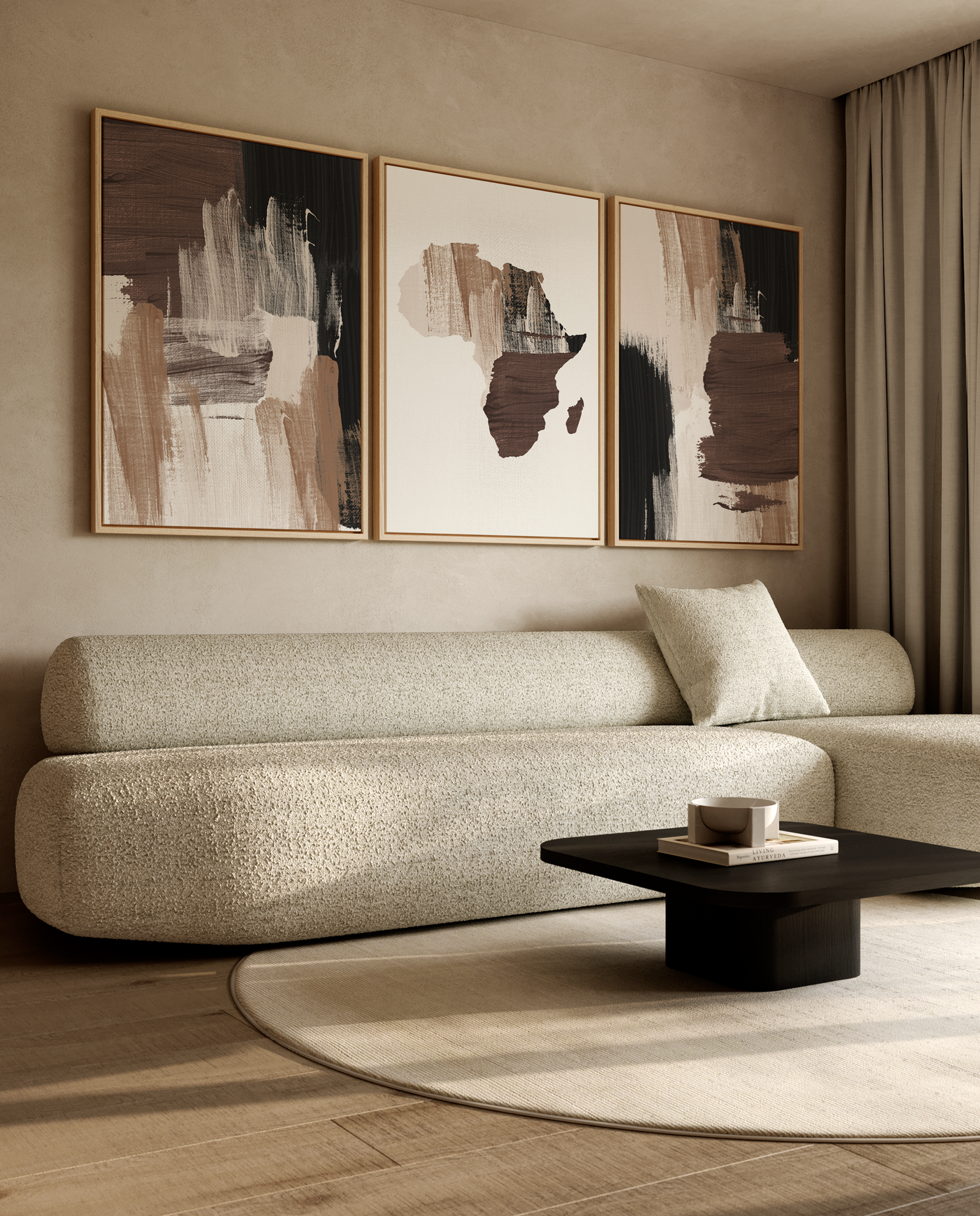 Three framed abstract art prints featuring Africa are displayed on a beige wall above a modern textured beige sofa in a styled living room.