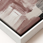 Close-up of a textured surface with brown and beige colors in a white frame.