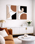 Modern living room with abstract burnt orange wall art set, white console table, and brown sofa.