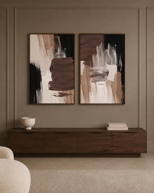 Two framed abstract wall art prints with brown, beige, black, and white brushstrokes, displayed side by side.