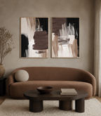 Abstract art featuring textured brushstrokes in brown, beige, black, and white.