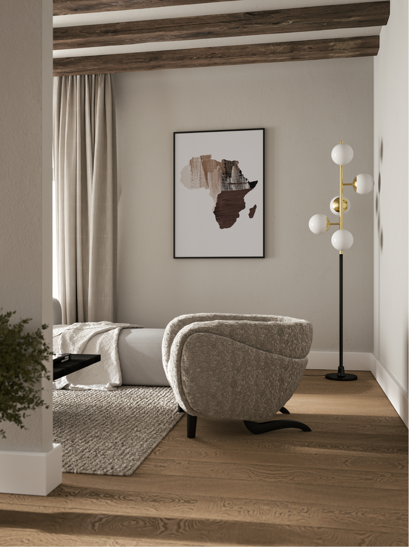 Modern living room with a gray armchair, floor lamp, and Africa wall art.
