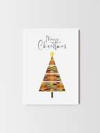 Christmas greeting card featuring an African-inspired kente-patterned Christmas tree