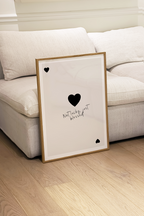 Interior styling scene showing framed wall art displayed above furniture