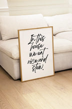Framed artwork arranged in a contemporary living room layout