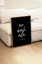 Interior styling scene with framed wall art arranged as a gallery display