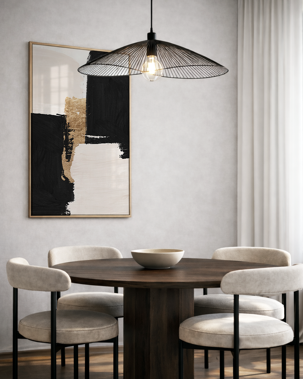 abstract gold and black artwork in a modern dining room