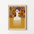 A framed art print featuring a stylized white afro comb against a mustard yellow background.