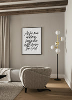 Styled interior scene featuring Christian wall art displayed above furniture