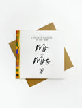 Minimal Mr and Mrs wedding card featuring elegant lettering