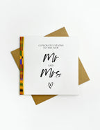 Minimal Mr and Mrs wedding card featuring elegant lettering