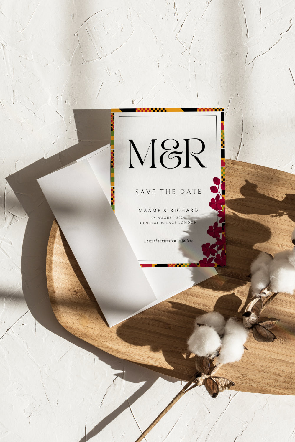 Save the date wedding card featuring a kente-inspired design for an African wedding