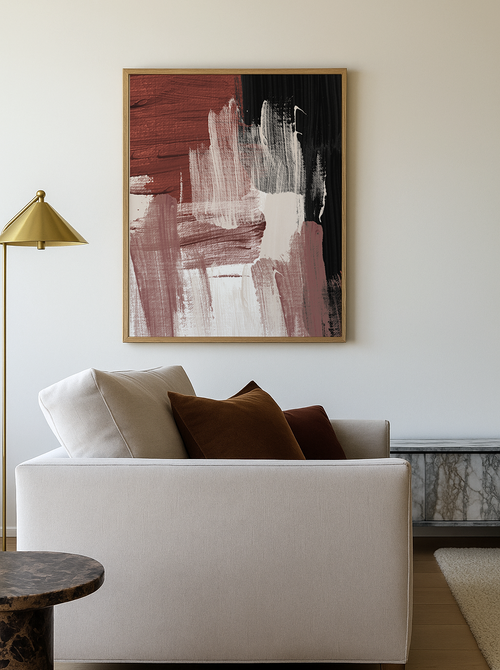 Modern living room with a white sofa, abstract painting, and decorative lamp.