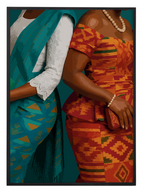 Two  traditional African women in colorful traditional attire.
