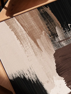 Close-up view of abstract canvas art in brown beige and soft neutral tones