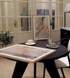 Alternate presentation of new wall art designs in a styled setting