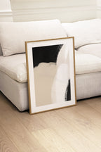 Close-up view of the Odo print in front of a cream sofa