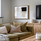 Beige and neutral abstract wall art with green sofa in modern livingroom