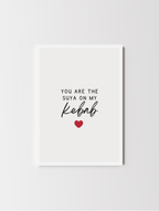 Single African-inspired Valentine’s card styled on a neutral background