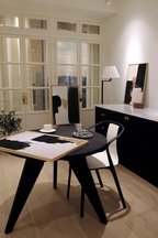 Styled interior scene with framed wall art arranged on a neutral wall