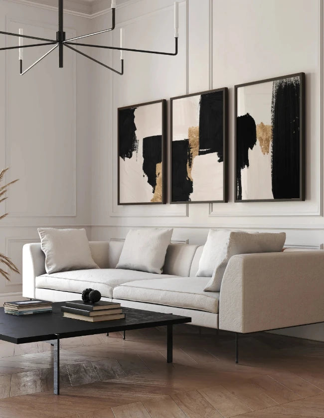 Curated wall gallery featuring multiple framed artworks arranged together